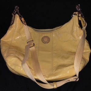 Bright yellow coach bag